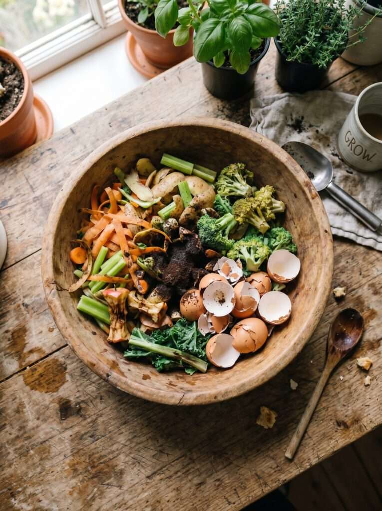 A bowl of organic kitchen scraps ready for composting.